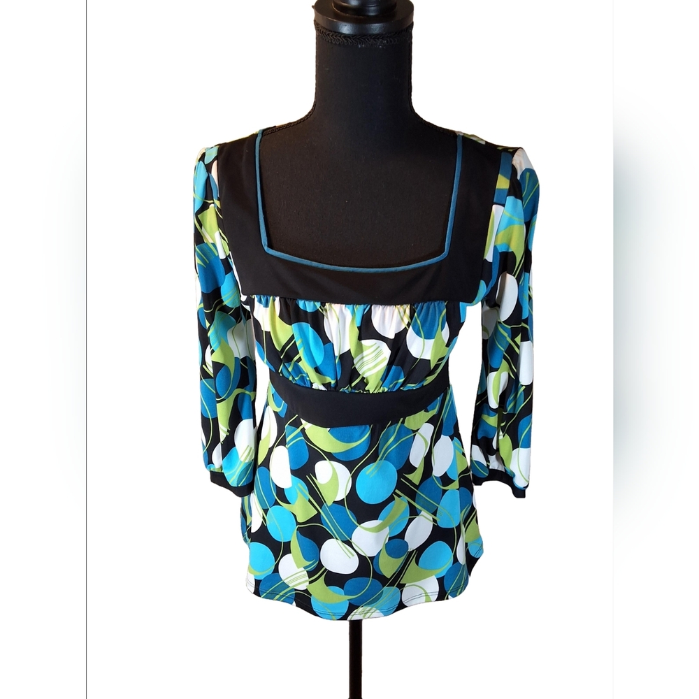 Unleash Your Versatility with our Square Neck Polka Dot Maurices Top!
